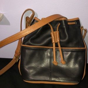 dark blue and brown satchel purse